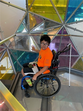 camper exploring inside Kiewit Luminarium