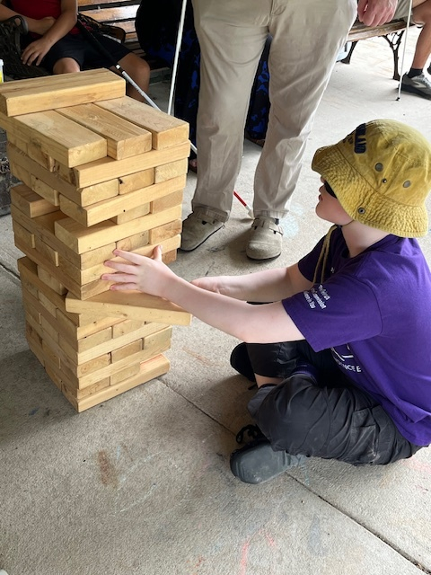 camper playing Jenga